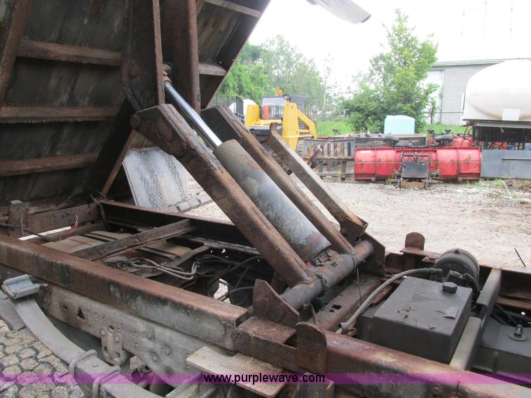 image for item K5102 2002 Ford F450 Super Duty XL Crew Cab dump flat bed truck