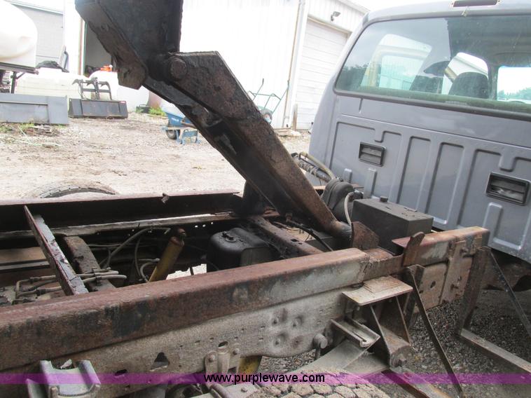 image for item K5102 2002 Ford F450 Super Duty XL Crew Cab dump flat bed truck