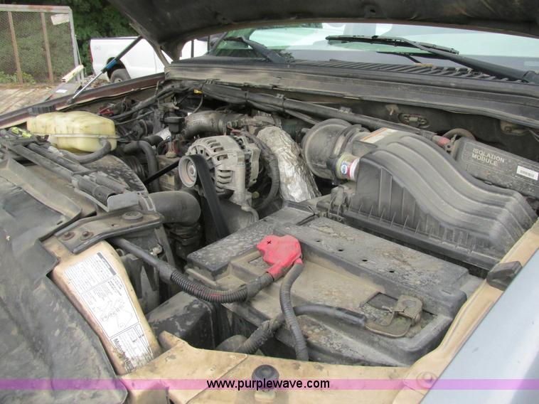 image for item K5102 2002 Ford F450 Super Duty XL Crew Cab dump flat bed truck