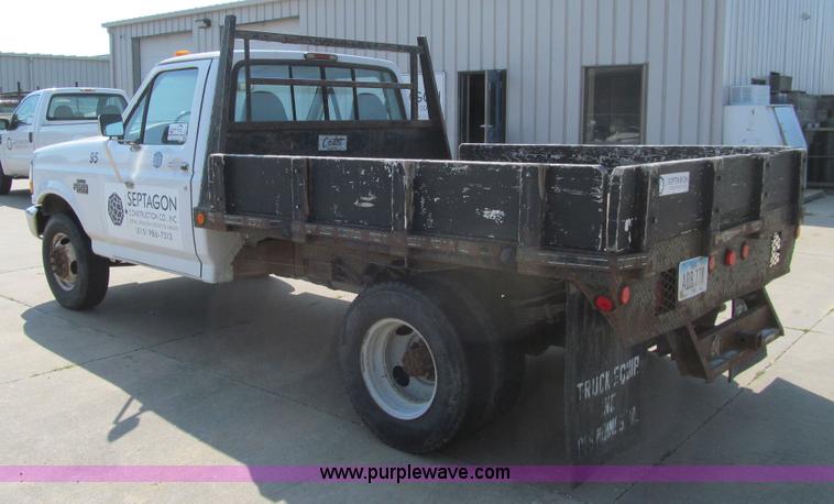 image for item K6320 1997 Ford F350 XL flatbed pickup truck