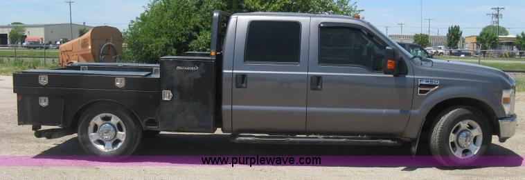 image for item K8652 2010 Ford F350 Super Duty XLT Crew Cab flatbed pickup truck