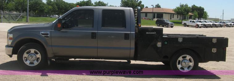 image for item K8652 2010 Ford F350 Super Duty XLT Crew Cab flatbed pickup truck