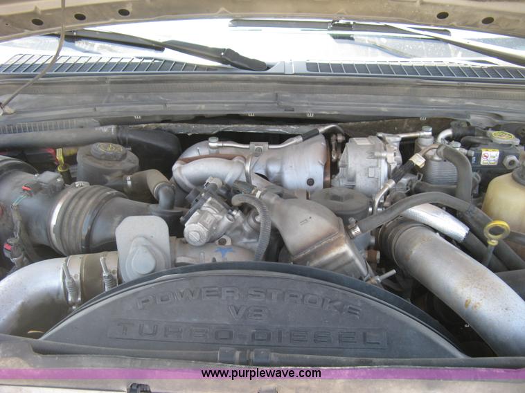 image for item K8652 2010 Ford F350 Super Duty XLT Crew Cab flatbed pickup truck