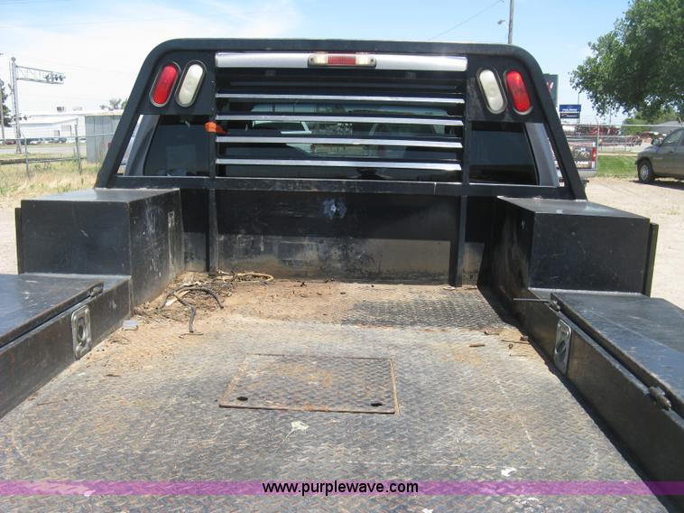 image for item K8652 2010 Ford F350 Super Duty XLT Crew Cab flatbed pickup truck