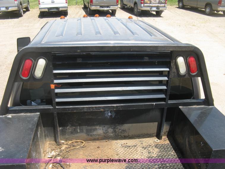 image for item K8652 2010 Ford F350 Super Duty XLT Crew Cab flatbed pickup truck