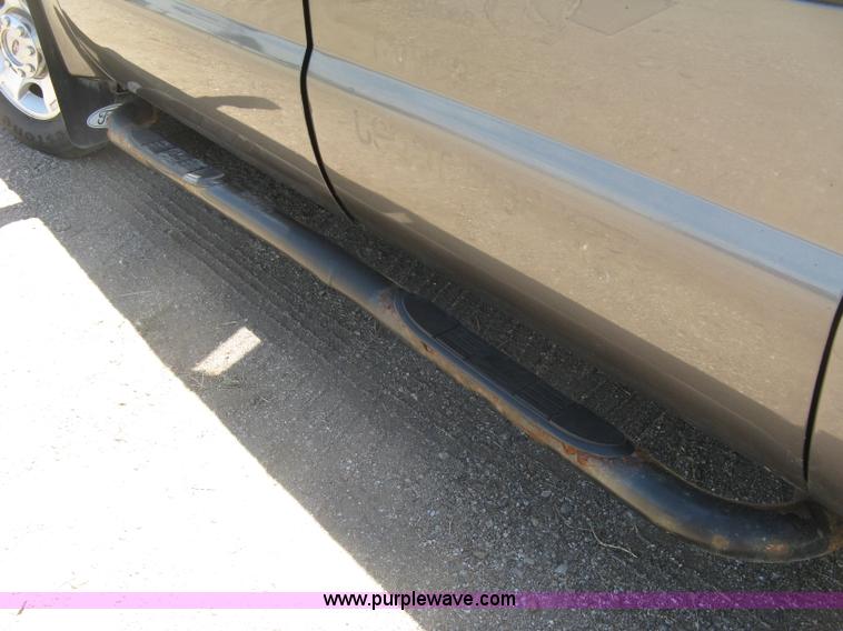 image for item K8652 2010 Ford F350 Super Duty XLT Crew Cab flatbed pickup truck