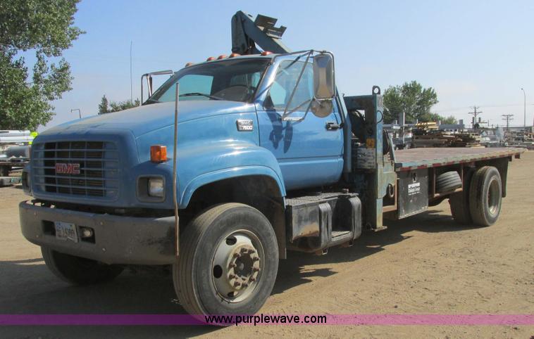 image for item A8854 1998 GMC C7500 flat bed truck with crane