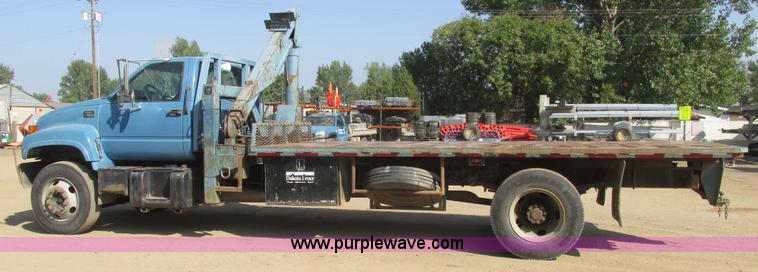 image for item A8854 1998 GMC C7500 flat bed truck with crane
