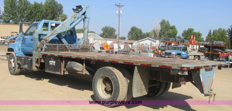 image for item A8854 1998 GMC C7500 flat bed truck with crane