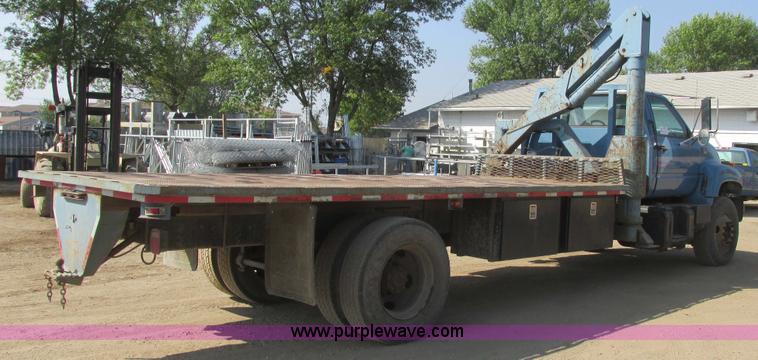 image for item A8854 1998 GMC C7500 flat bed truck with crane
