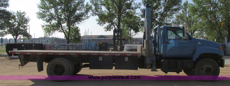 image for item A8854 1998 GMC C7500 flat bed truck with crane