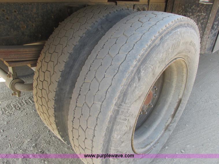 image for item A8854 1998 GMC C7500 flat bed truck with crane