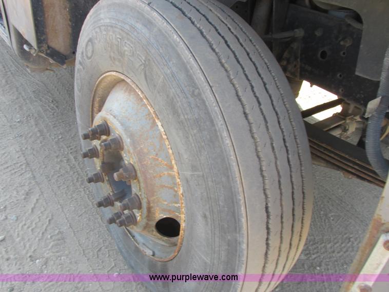 image for item A8854 1998 GMC C7500 flat bed truck with crane