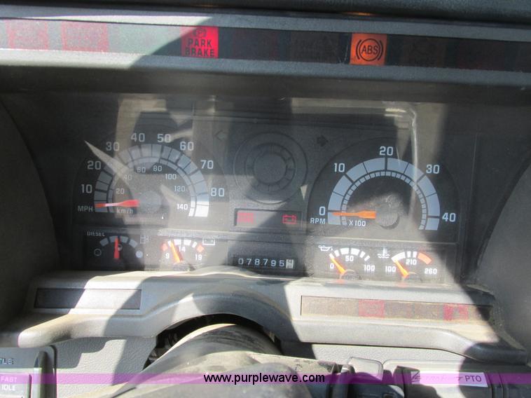 image for item A8854 1998 GMC C7500 flat bed truck with crane