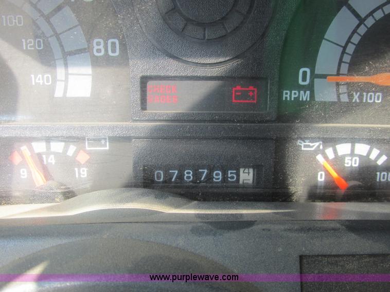 image for item A8854 1998 GMC C7500 flat bed truck with crane