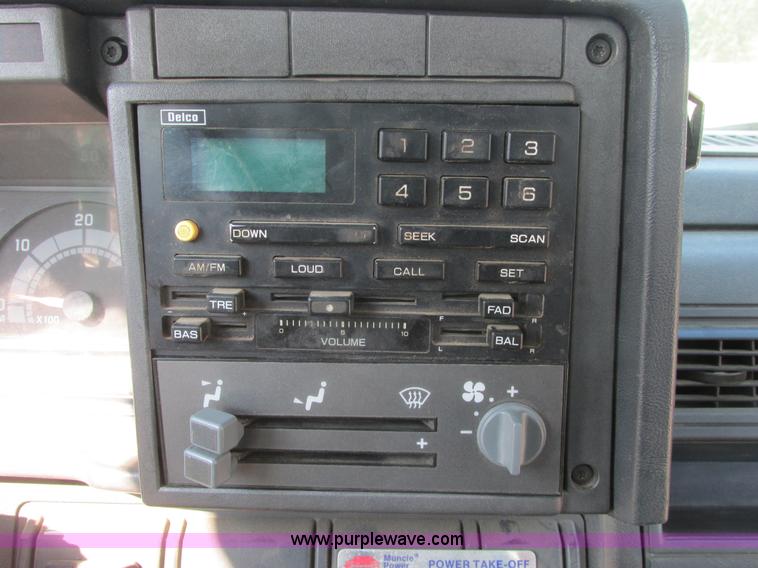 image for item A8854 1998 GMC C7500 flat bed truck with crane