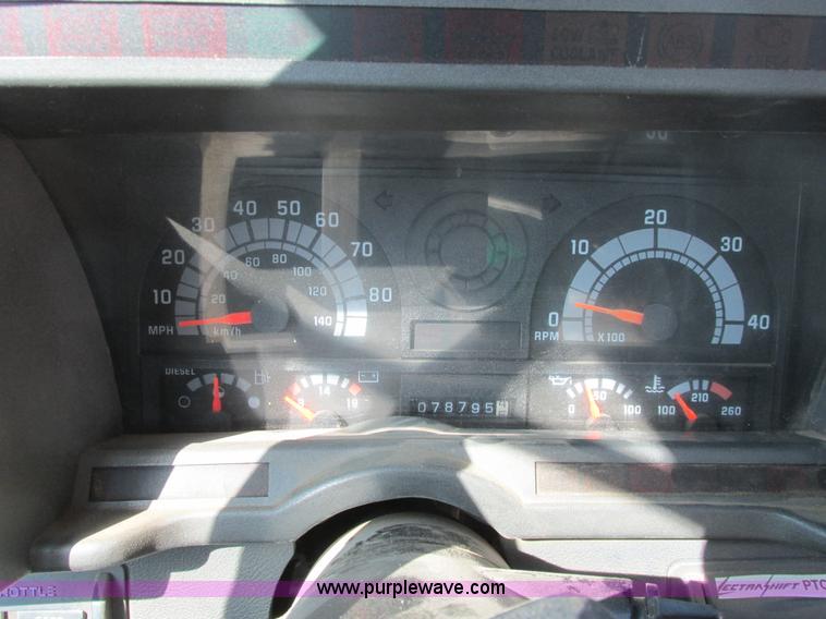 image for item A8854 1998 GMC C7500 flat bed truck with crane