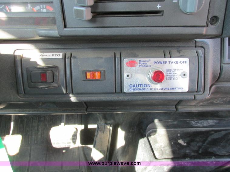 image for item A8854 1998 GMC C7500 flat bed truck with crane