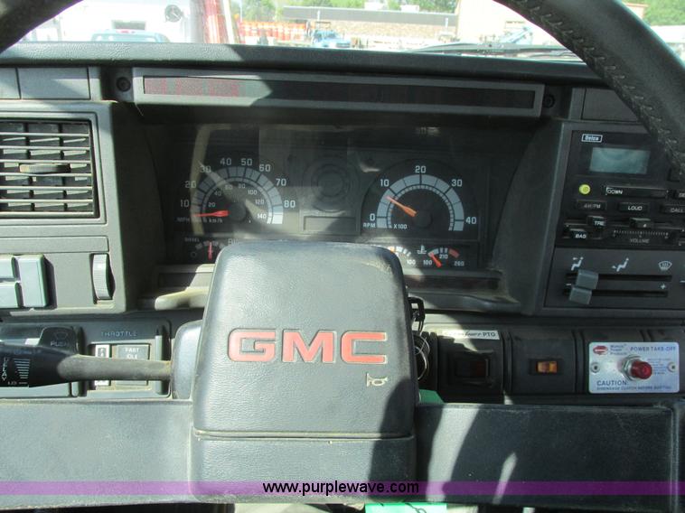 image for item A8854 1998 GMC C7500 flat bed truck with crane