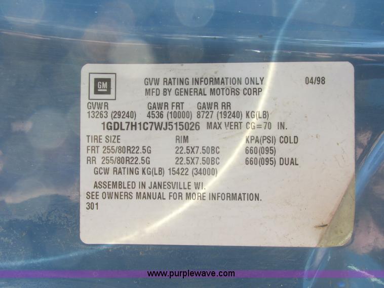 image for item A8854 1998 GMC C7500 flat bed truck with crane