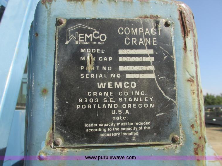 image for item A8854 1998 GMC C7500 flat bed truck with crane