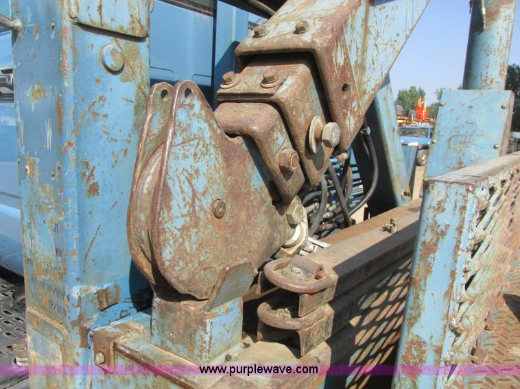 image for item A8854 1998 GMC C7500 flat bed truck with crane