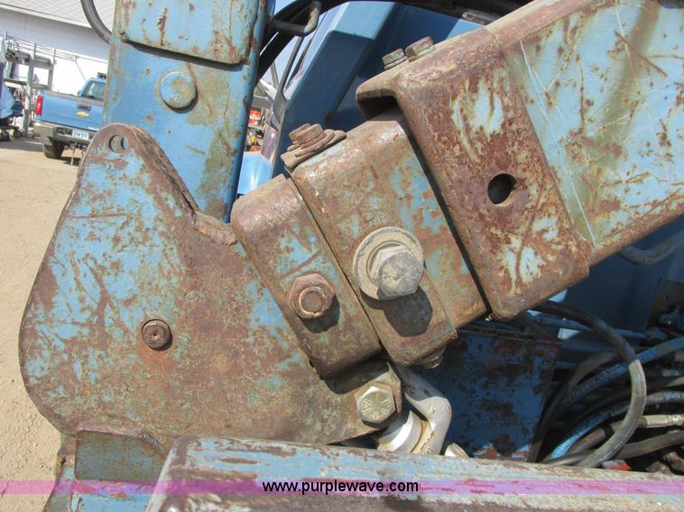 image for item A8854 1998 GMC C7500 flat bed truck with crane