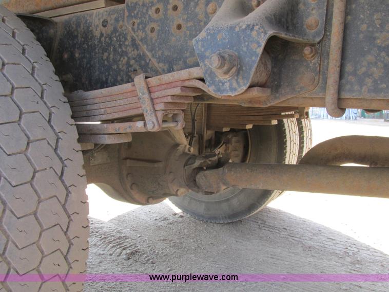 image for item A8854 1998 GMC C7500 flat bed truck with crane