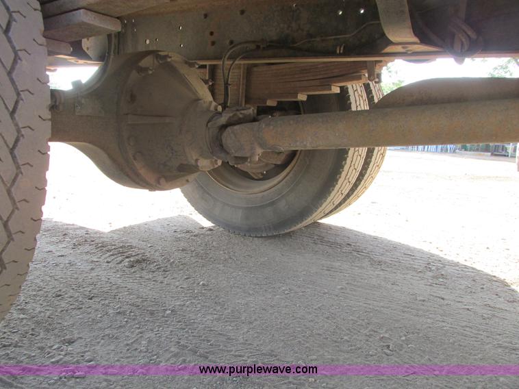 image for item A8854 1998 GMC C7500 flat bed truck with crane