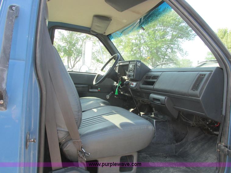 image for item A8854 1998 GMC C7500 flat bed truck with crane