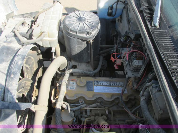 image for item A8854 1998 GMC C7500 flat bed truck with crane