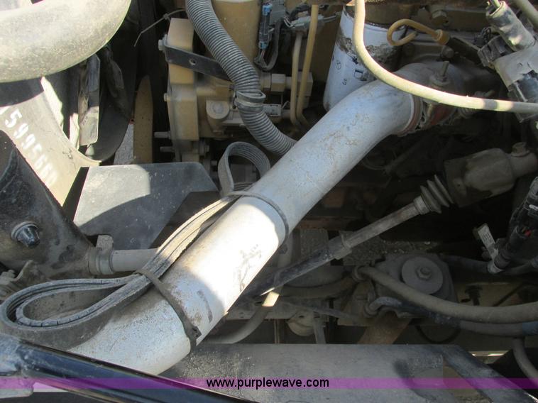 image for item A8854 1998 GMC C7500 flat bed truck with crane