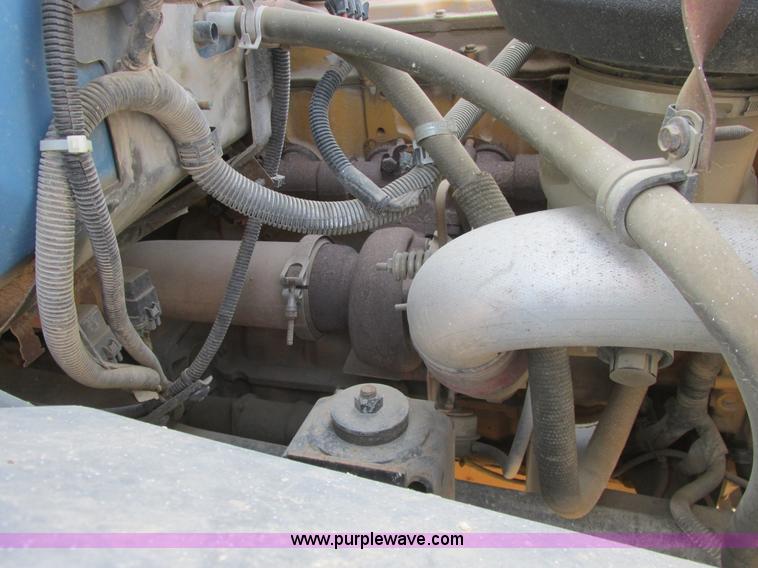 image for item A8854 1998 GMC C7500 flat bed truck with crane