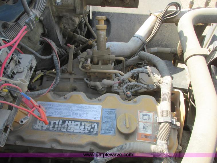 image for item A8854 1998 GMC C7500 flat bed truck with crane