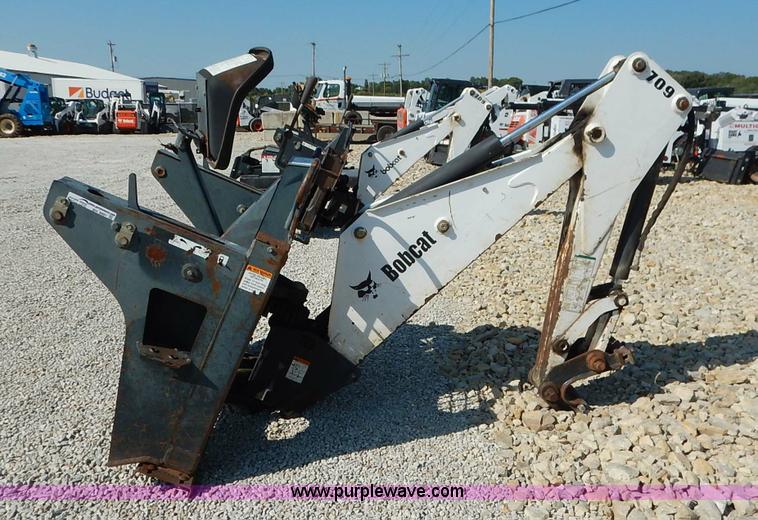 image for item BH9991 Bobcat 709 skid steer backhoe attachment