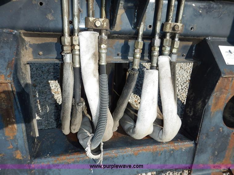 image for item BH9991 Bobcat 709 skid steer backhoe attachment