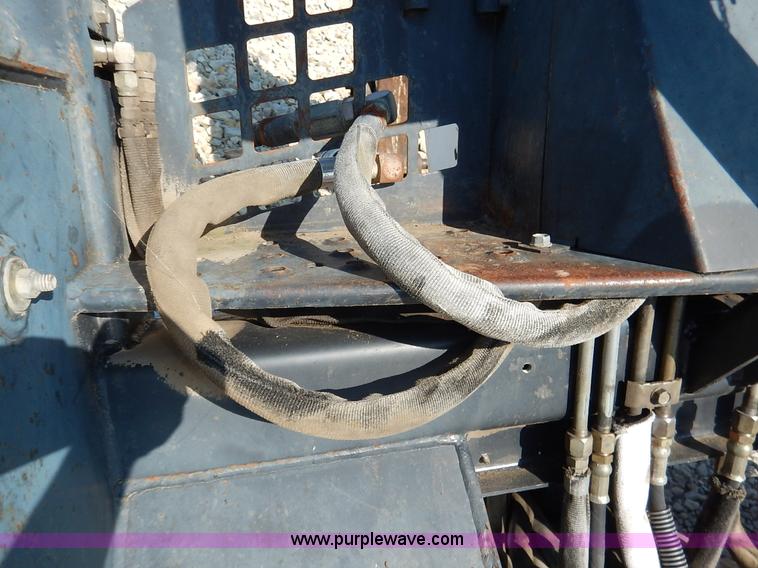 image for item BH9991 Bobcat 709 skid steer backhoe attachment