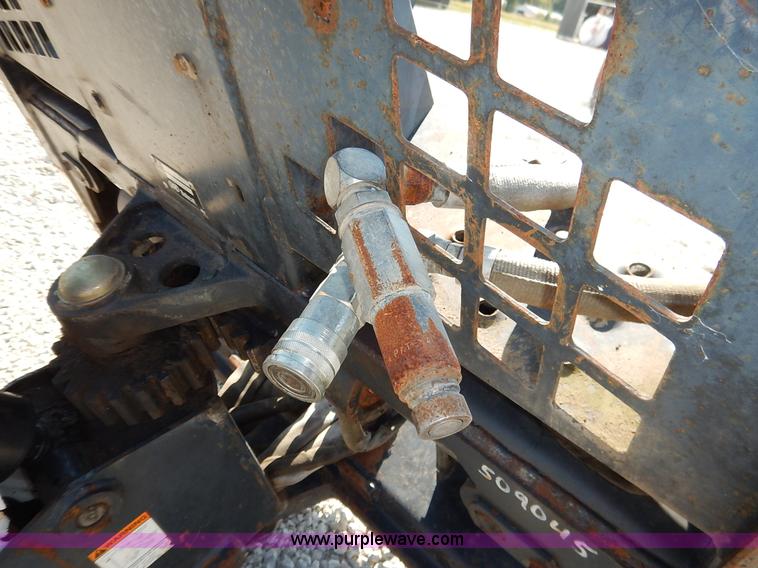 image for item BH9991 Bobcat 709 skid steer backhoe attachment