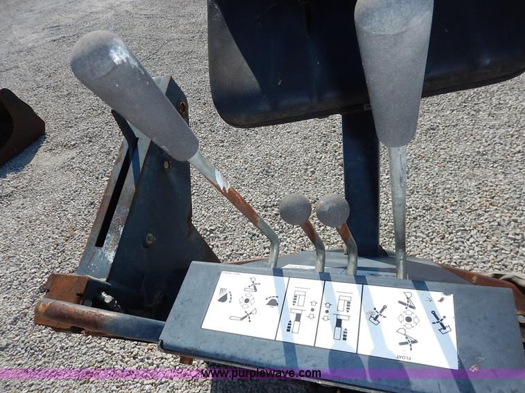 image for item BH9991 Bobcat 709 skid steer backhoe attachment