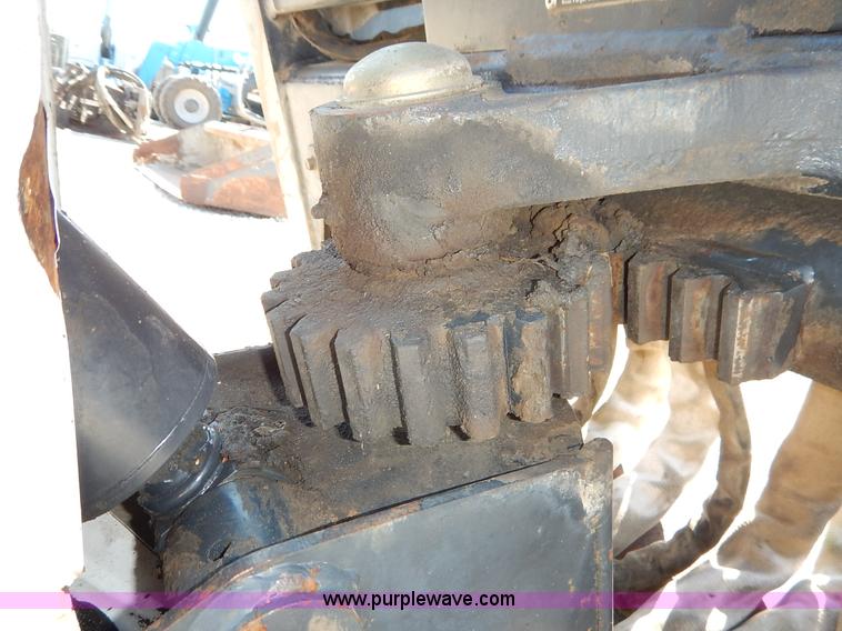 image for item BH9991 Bobcat 709 skid steer backhoe attachment