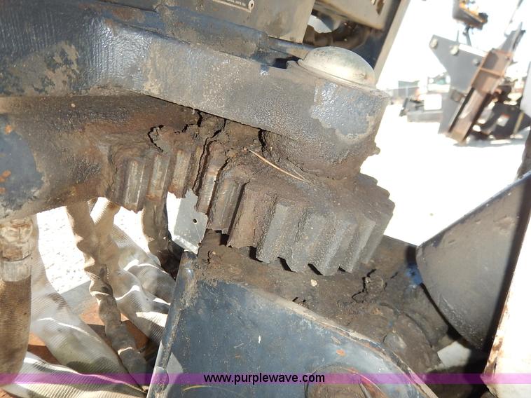 image for item BH9991 Bobcat 709 skid steer backhoe attachment