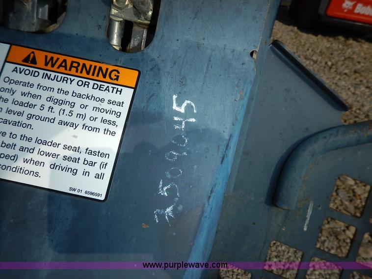 image for item BH9991 Bobcat 709 skid steer backhoe attachment