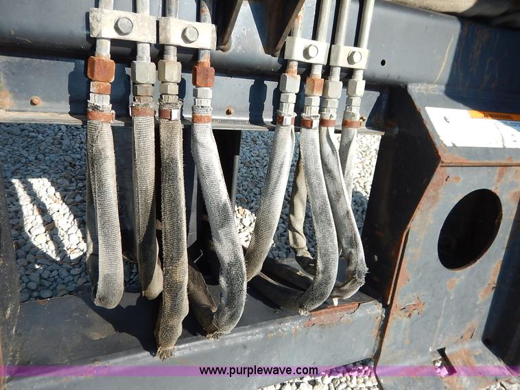 image for item BH9992 Bobcat 709FDS skid steer backhoe attachment