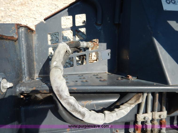 image for item BH9992 Bobcat 709FDS skid steer backhoe attachment