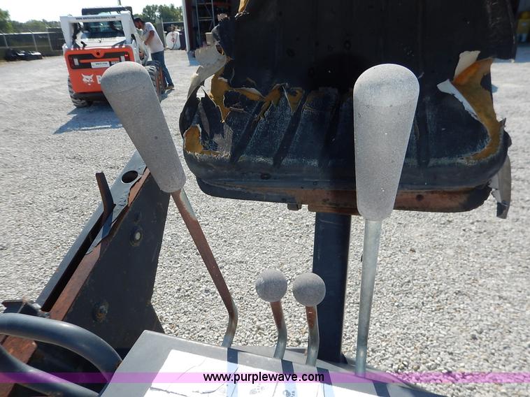 image for item BH9992 Bobcat 709FDS skid steer backhoe attachment