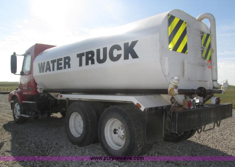 image for item H1179 2002 Volvo VNM water truck