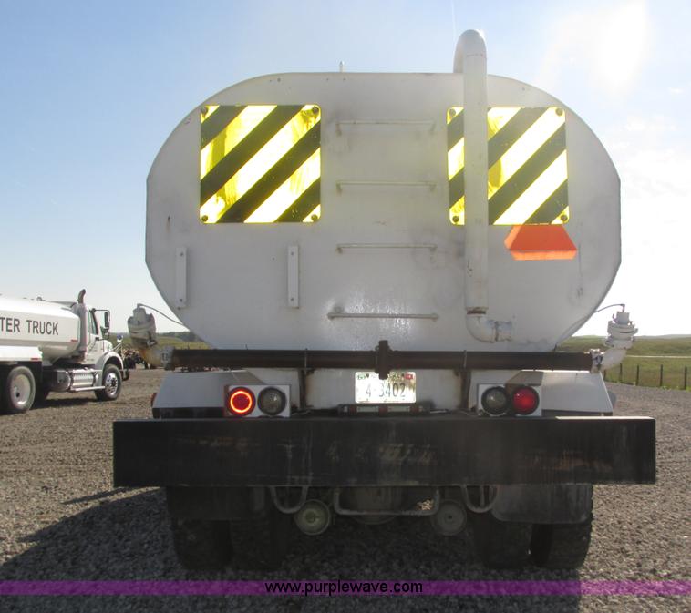 image for item H1179 2002 Volvo VNM water truck