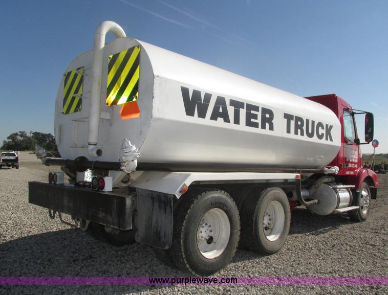 image for item H1179 2002 Volvo VNM water truck