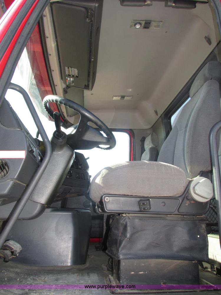 image for item H1179 2002 Volvo VNM water truck