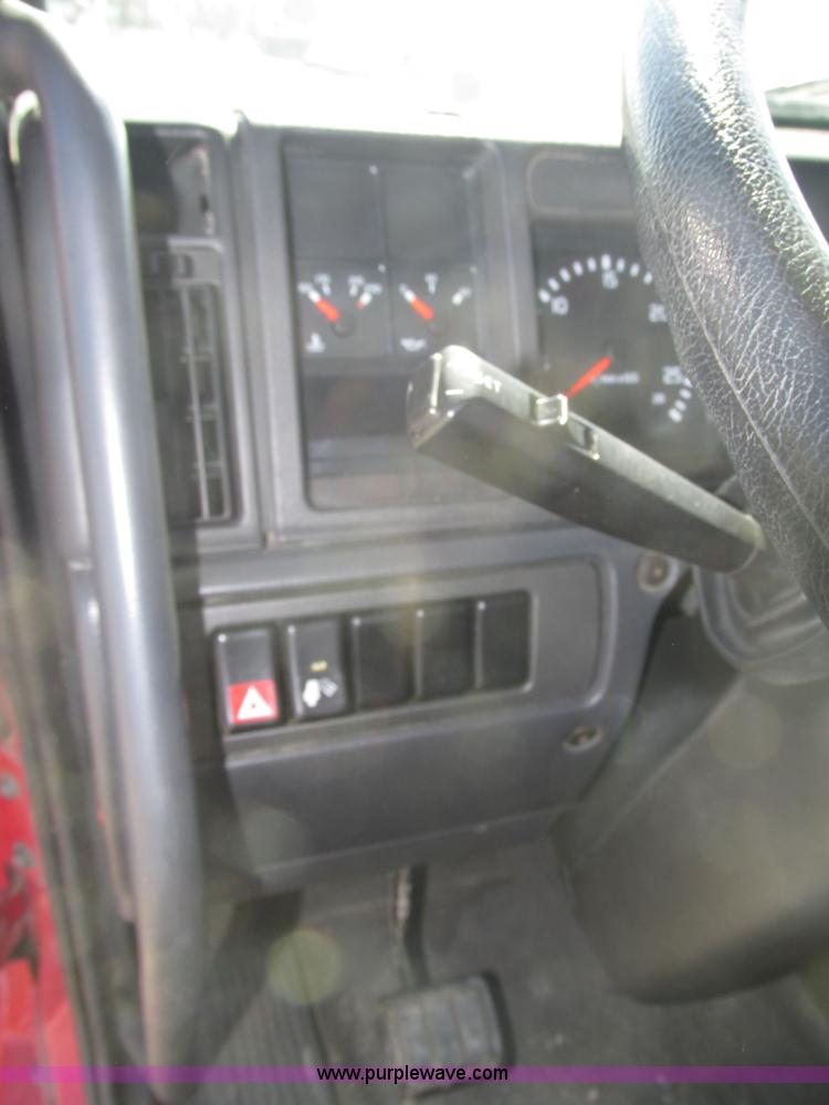 image for item H1179 2002 Volvo VNM water truck